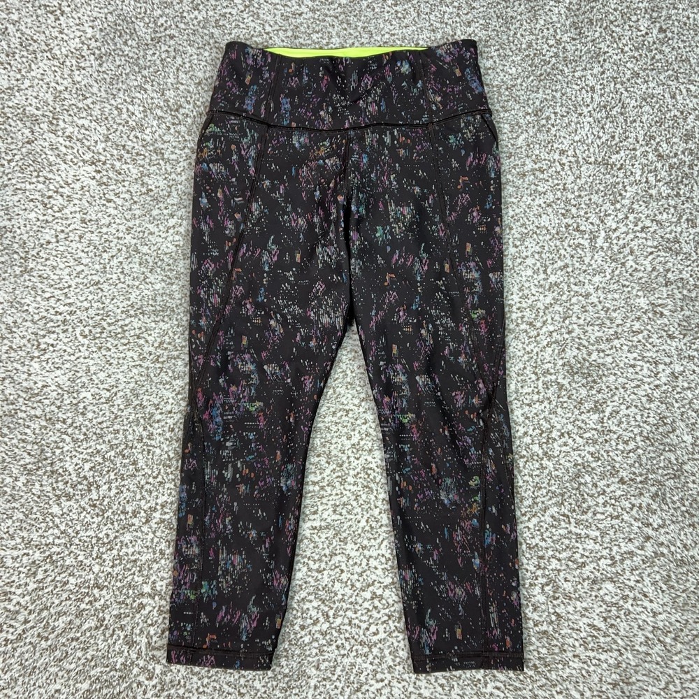 Athleta Pants Womens Small Black Capri Leggings Pockets Lightning City Lights‎